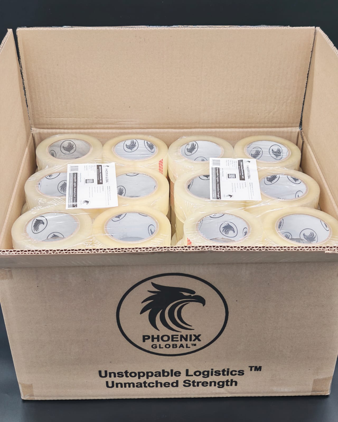 Phoenix Global branded shipping box packed with rolls of clear BOPP carton sealing tape
